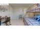 This bedroom has carpeted floors, a bunk bed, and a large window at 158 Ventor Way, Mooresville, NC 28115