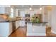 Modern kitchen featuring white cabinets, granite countertops, and stainless steel appliances at 158 Ventor Way, Mooresville, NC 28115