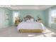 Spacious main bedroom bathed in natural light, featuring large windows and neutral decor at 158 Ventor Way, Mooresville, NC 28115