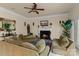 Comfortable living room boasts a cozy fireplace and comfortable seating at 16614 Ruby Hill Pl, Charlotte, NC 28278