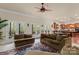 Open-concept living space with access to an outdoor balcony, kitchen and dining area at 16614 Ruby Hill Pl, Charlotte, NC 28278