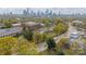 A neighborhood aerial view showcases the cityscape, buildings, trees, and streets within a beautiful urban area at 1933 W Trade St, Charlotte, NC 28216
