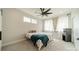 Bright bedroom with a ceiling fan, neutral carpet and a single bed at 1933 W Trade St, Charlotte, NC 28216