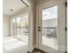 Bedroom with sliding glass doors leading to an outdoor seating area at 1933 W Trade St, Charlotte, NC 28216