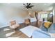 Open-concept living room with hardwood floors, modern seating, and natural light in a contemporary home at 1933 W Trade St, Charlotte, NC 28216