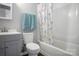 Cozy bathroom with tub-shower combo, nautical themed shower curtain, and vanity sink at 200 W Shannonhouse St, Shelby, NC 28152