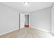 Bedroom with neutral carpet and door to another room at 2124 Marquesas Ave, Tega Cay, SC 29708