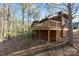 View of the wooden deck and the lattice work around the home's exterior at 2124 Marquesas Ave, Tega Cay, SC 29708
