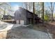 Exterior view of a home with an attached two-car garage and a long drive at 2124 Marquesas Ave, Tega Cay, SC 29708