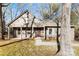 Charming single-story home with covered porch and well-maintained lawn in a peaceful neighborhood at 2124 Marquesas Ave, Tega Cay, SC 29708