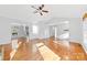Bright, open living room featuring hardwood floors, vaulted ceiling, and views to other rooms at 2124 Marquesas Ave, Tega Cay, SC 29708