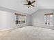 Spacious main bedroom with natural light and plush carpet at 2124 Marquesas Ave, Tega Cay, SC 29708