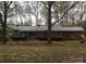Lovely brick home with mature trees, offering a serene and private setting at 235 John Rainey Rd, Salisbury, NC 28147