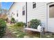 Backyard with a bench, foliage and a stone pavers at 2363 Shanklin S Ln, Denver, NC 28037