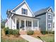 Charming two-story home with front porch and beautifully landscaped front yard at 2363 Shanklin S Ln, Denver, NC 28037