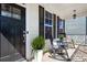 Welcoming front porch with rocking chairs and stylish decor at 2363 Shanklin S Ln, Denver, NC 28037