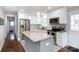 Modern kitchen features stainless steel appliances, granite countertops, and island at 2408 Dora Dr, Charlotte, NC 28215