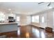 Open floorplan with a kitchen featuring stainless steel appliances and views of the living room at 2408 Dora Dr, Charlotte, NC 28215