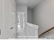 Upstairs hallway with white walls, carpet, and multiple white doors at 282 Gilead Rd, Huntersville, NC 28078