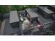 Aerial view of a stylish rooftop terrace featuring dining and lounge seating at 2516 Park Rose Ln # 15, Charlotte, NC 28204