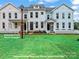 Charming townhomes with extended front porches and well-manicured lawns at 284 Gilead Rd, Huntersville, NC 28078