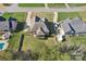 Aerial view of a home featuring a well-maintained yard and patio in a peaceful neighborhood setting at 304 Wintergreen Ct, Kings Mountain, NC 28086