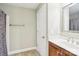 Bathroom offers a vanity with storage and a shower with a patterned curtain at 304 Wintergreen Ct, Kings Mountain, NC 28086