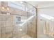 The tiled walk-in shower features built-in niche shelving at 304 Wintergreen Ct, Kings Mountain, NC 28086