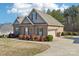 Charming brick home with an attached garage and beautifully landscaped yard at 304 Wintergreen Ct, Kings Mountain, NC 28086