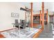 Modern dining room with hardwood floors, statement chandelier, and open floorplan at 3249 Ivey Creek Rd, Maiden, NC 28650