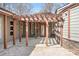 Charming front entrance featuring a stone facade, a pergola, and a beautifully designed doorway for a grand welcome at 3249 Ivey Creek Rd, Maiden, NC 28650