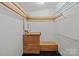 Walk-in closet with custom shelving and organization system at 325 Hurley School Rd, Salisbury, NC 28147