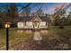 Charming single-story home with a walkway leading to the front door and a well-maintained lawn at 325 Hurley School Rd, Salisbury, NC 28147