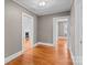 A hallway with views into other rooms shows a fireplace and an open floor plan at 325 Hurley School Rd, Salisbury, NC 28147