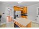 Kitchen with stainless appliances, an island and wood cabinets with glass doors at 325 Hurley School Rd, Salisbury, NC 28147