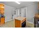 Kitchen with an island, wood cabinets and stainless appliances at 325 Hurley School Rd, Salisbury, NC 28147