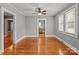 Bright living room with hardwood floors, views of other rooms and neutral paint at 325 Hurley School Rd, Salisbury, NC 28147