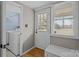 A convenient mudroom with laundry hook ups has outdoor access and a view of the backyard at 325 Hurley School Rd, Salisbury, NC 28147
