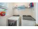 Bright laundry area features modern Samsung washer and dryer, storage shelf, and a window at 3846 Bent Creek Sw Dr # 58, Concord, NC 28027