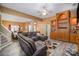 Open-concept living space with hardwood floors, a plush leather couch, and seamlessly adjoined to the dining area at 3846 Bent Creek Sw Dr # 58, Concord, NC 28027