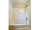 Bathroom featuring a white tub and shower combination at 6008 Grassy Knoll Cir, Matthews, NC 28104