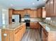 Modern kitchen with stainless steel appliances, granite countertops, and a central island at 6008 Grassy Knoll Cir, Matthews, NC 28104