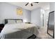 Bedroom featuring grey walls, carpet and a ceiling fan at 6359 Mallard View Ln, Charlotte, NC 28269