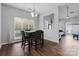Inviting dining room with modern table set and natural light at 6359 Mallard View Ln, Charlotte, NC 28269