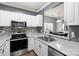 Bright and functional kitchen with stainless appliances and plenty of countertop space at 6359 Mallard View Ln, Charlotte, NC 28269