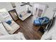 Top-down view of the bright living room featuring hardwood floors, sofas and a ceiling fan at 6359 Mallard View Ln, Charlotte, NC 28269