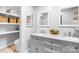 Elegant bathroom featuring double sinks, granite countertops, and ample storage at 6741 Stillmeadow Dr, Charlotte, NC 28277