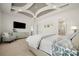 Spacious main bedroom with decorative ceiling and access to the bathroom at 7130 Irongate Dr, Indian Land, SC 29707