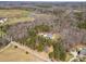 Aerial view of property with mature landscaping and long private drive at 722 Clegg Farm Dr, York, SC 29745