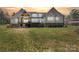 Back exterior of home with multiple decks overlooking large yard at 722 Clegg Farm Dr, York, SC 29745